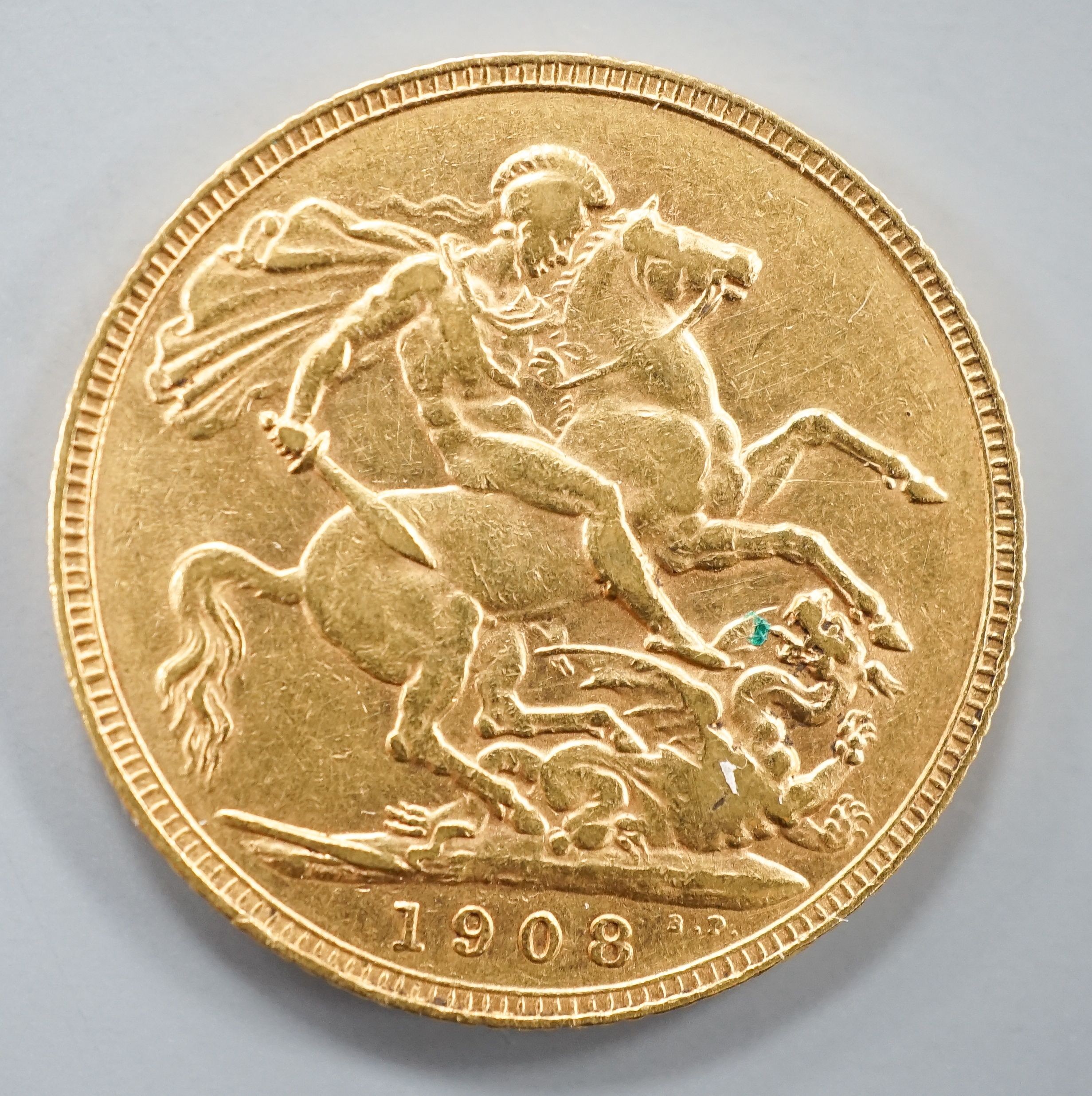 An Edward VII 1908 gold sovereign.